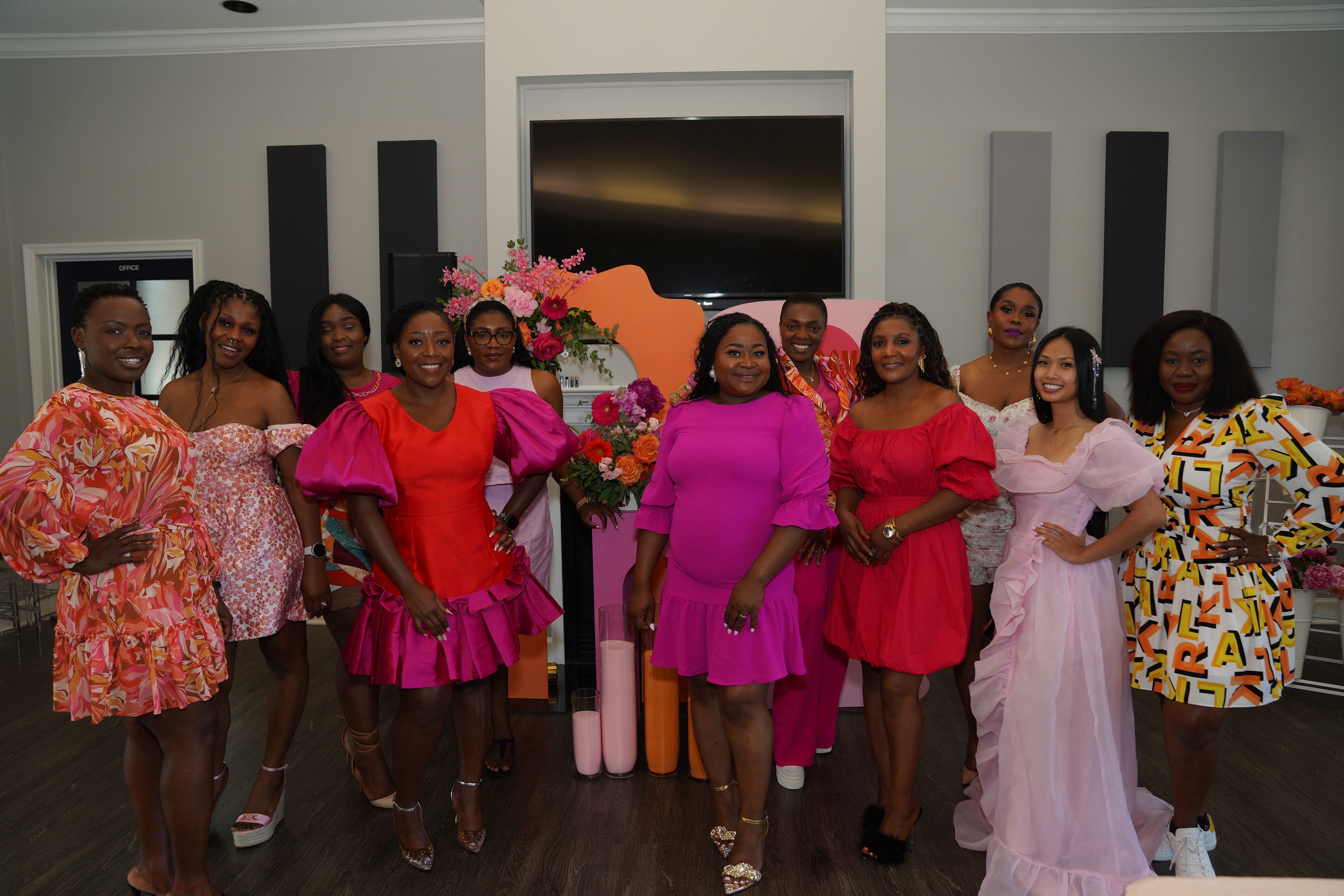 Full group photo of attendees at the Bloom event