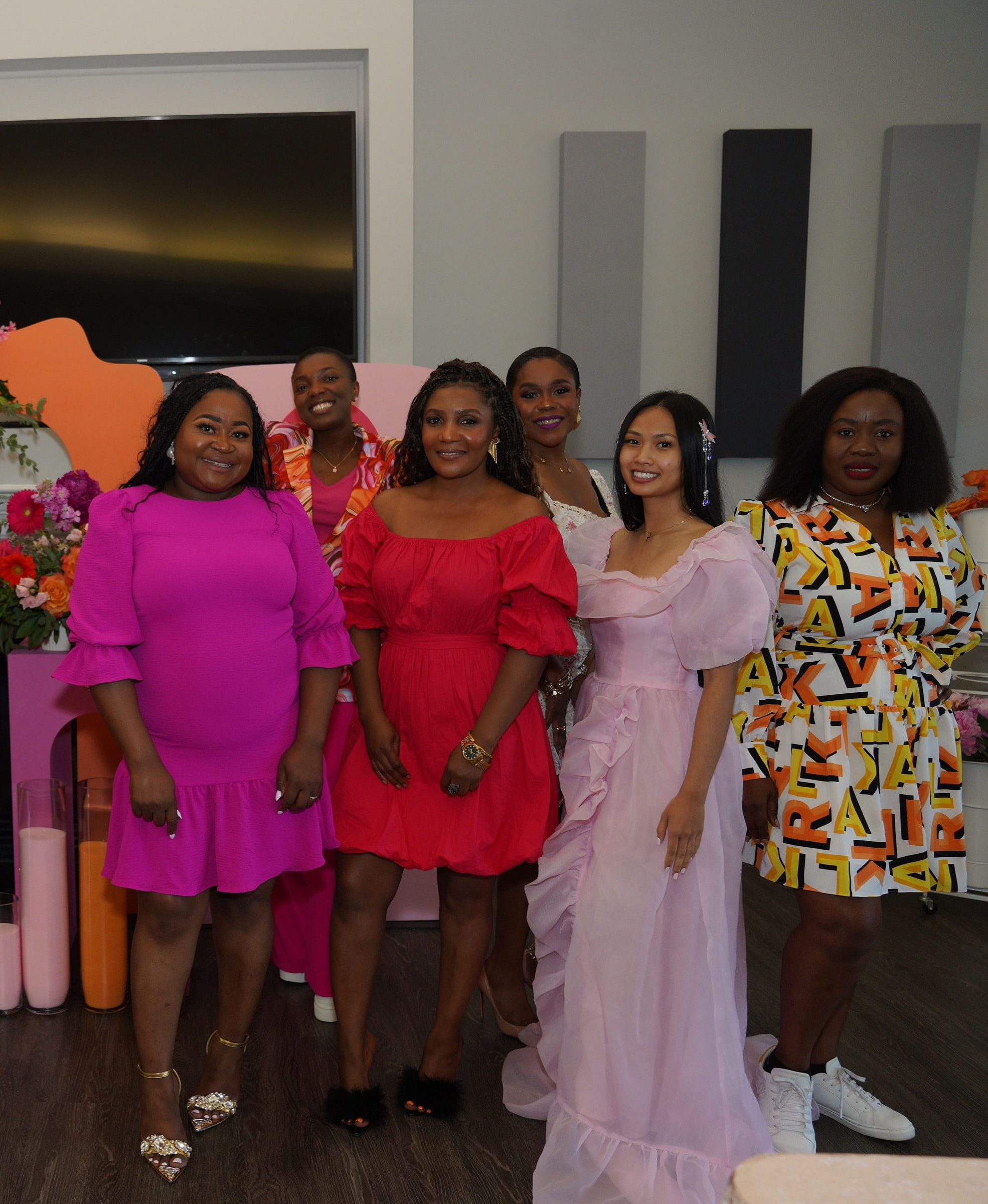 Dr. Angel with a group of six women at the Bloom event